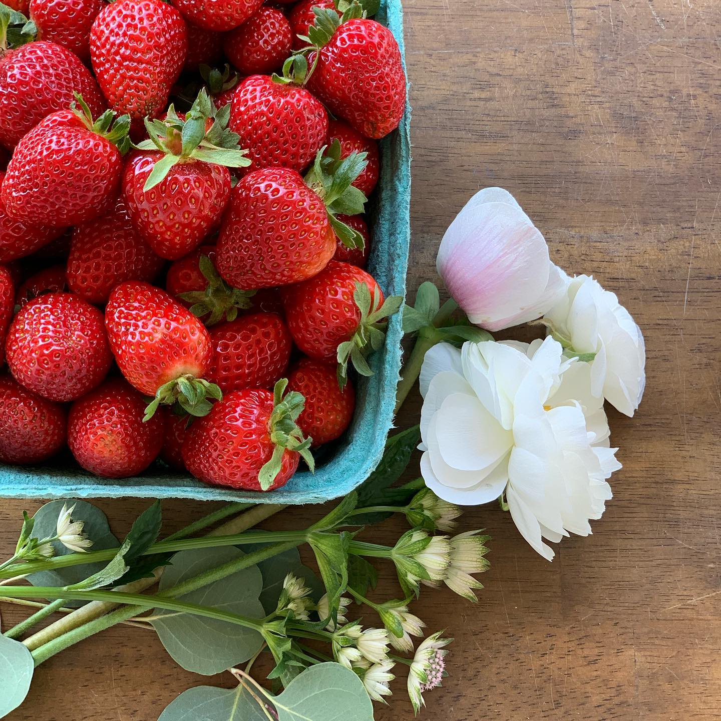 fresh strawberries and flowers